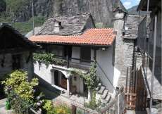 Ferien-Rustico in der Nähe vom Fluss Maggia am Eingang zum Maggiatal für 1 - 4 Personen (Nr. 091 - Ferienhaus im Tessin)