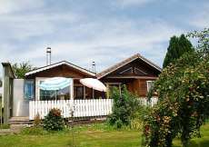 Ferienhaus im Jura mitten im Grünen mit Schwedenofen und Kinderschaukel 550 m ü. M. für 1 - 4 Personen (Nr. 226 - Ferienhaus im Jura)