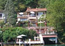 Ferienhaus am See mit Seeplatz und Motorboot auf Anfrage - 3-Zimmer-Ferienwohnung am Luganersee für 1 - 4 Personen zu vermieten (Nr. 128)